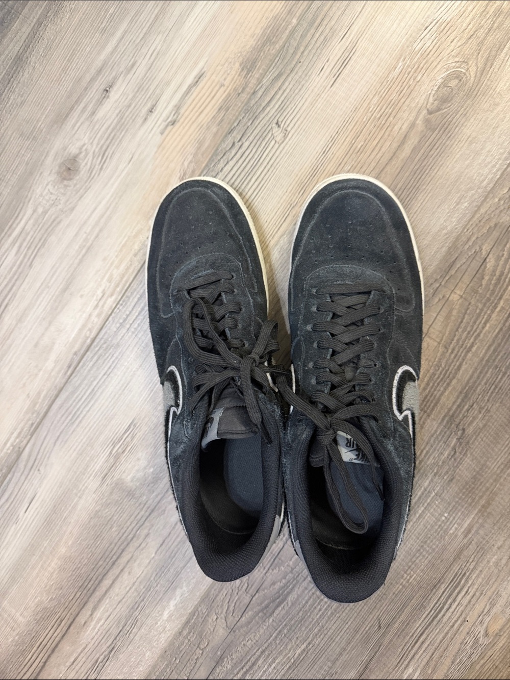 Nike Black Suede High-Top Sneakers with White Swoosh